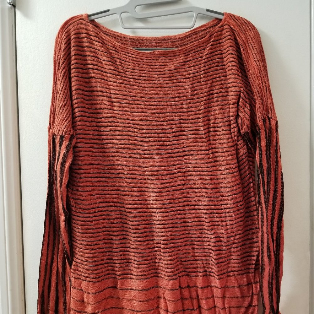 Long sleeve boat neckline stripped lightweight sweater knit top.
